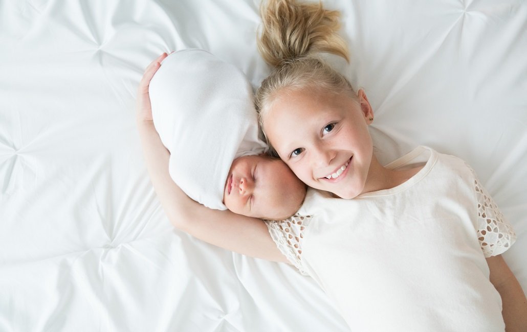 newborn photography session with sibling